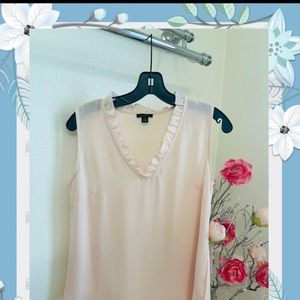 Ann Taylor Factory top with ruffle neckline.  Soft white pink
